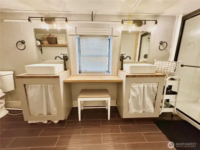 Primary Bathroom with double sinks and vanity