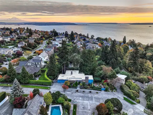 Commanding its corner parcel just above the bluff, 4221 W Armour sits quietly within one of Magnolia’s most coveted enclaves. With Olympic sunsets to the west, Mount Rainier rising in the southeast, and the shimmering curve of Puget Sound below, this home belongs not only to its lot—but to the vast, layered story of the Pacific Northwest.