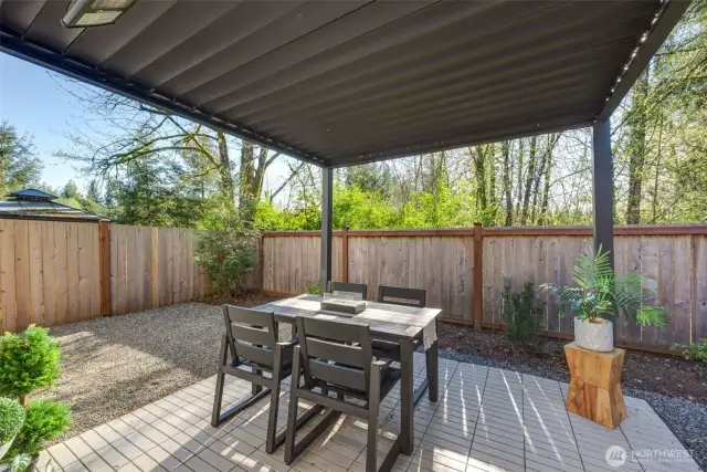 Great patio space complete with pergola.