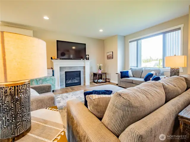 SUCH A COMFORTABLE SPACE...CUSTOM BLINDS THROUGHOUT HOME