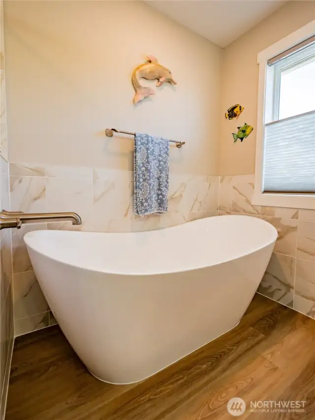 GRAB A GLASS OF VINO AND SLIP INTO THE SOAKING TUB AFTER A LONG DAY