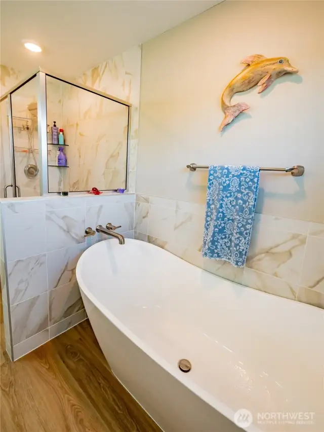FULLY TILED TUB SURROUND...SHOWER OR BATHE FOR DAYS WITH THE TANKLESS WATER HEATER