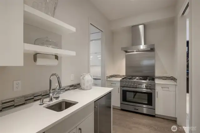 Prep kitchen with second stove, 3rd sink, 3rd dishwasher. walk-in pantry.