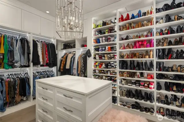 The closet is divided into two separate custom closets.