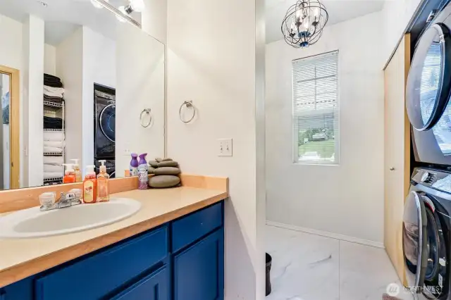 Full bath with newer washer and dryer