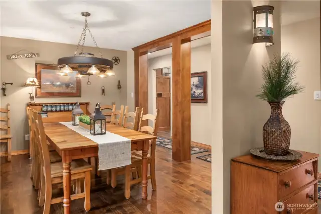 Formal Dining Room with beautiful wood millwork and walnut hardwood floors.