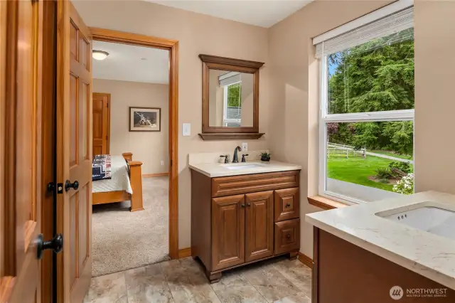 "Jack-n-Jill" Bathroom with double vanities between 3rd and 4th Bedrooms.  All doors throughout the home are solid core hardwood.