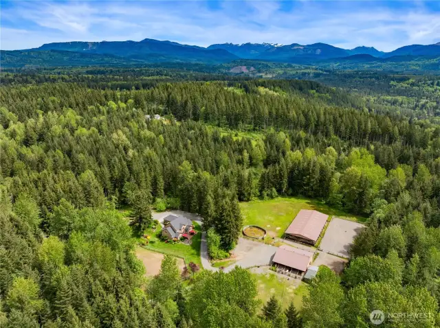 20 Acre site in Tolt River Highlands. Idyllic setting with Barn, Covered and Uncovered Arenas, Round Pen and Pasture.