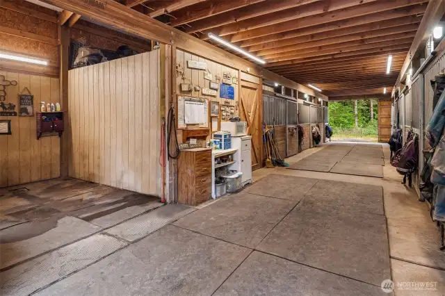 The 7 stall barn includes a hot/cold wash room, tack room, 25-ton hay storage and bathroom. The house and barn are served by a srandard generator that automatically runs the home and barn in the event of a power outage.