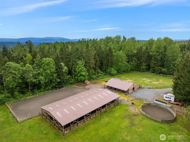 Equestrian facilities include a Barn with 7 Stalls (12x12) with 12x24 half-covered paddocks attached, 60x120 covered and lighted arena, 80x160 outdoor arena,  round pen, pasture turn out and trailer parking!