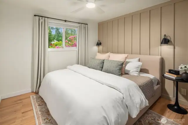 Thoughtful touches like board and batten walls in the bedroom add texture, charm, and a designer feel to the space.