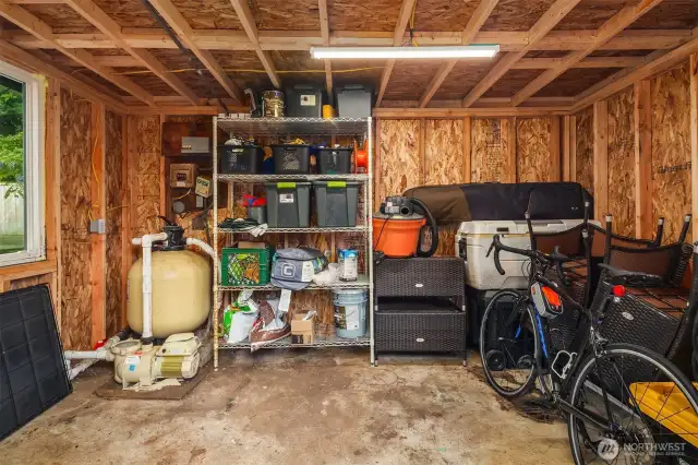 Poolhouse, Workshop, Storage. Great space to turn into a gym or office.