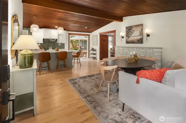 Exposed wood beams and vaulted wood ceilings create a stunning architectural focal point.