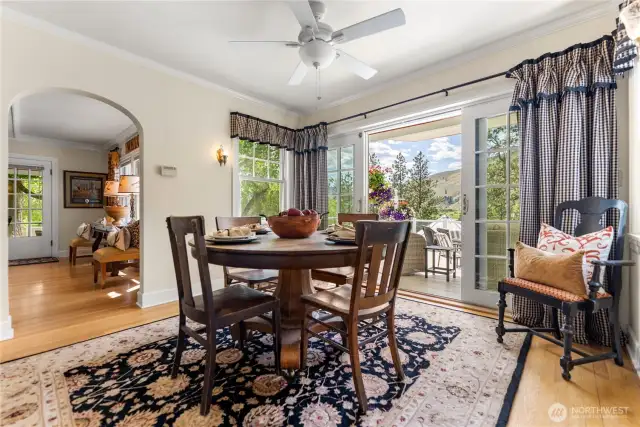 Bright and inviting, this light-filled dining area captures the essence of ranch living—gather, host, and dine with views of river, trees, and sunlit hills.