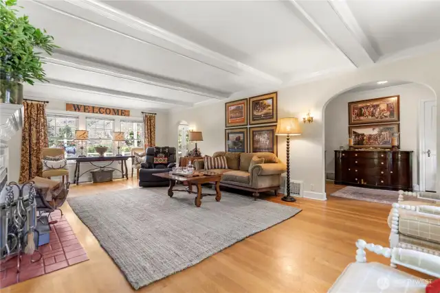 Graceful archways and classic finishes connect living spaces, creating flow and charm throughout the home.