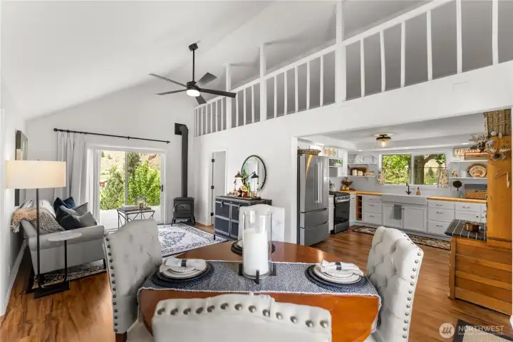 Expansive river view from this beautifully renovated guest house; interior with vaulted ceilings, open design, so welcoming and ready for guests to relax in style.