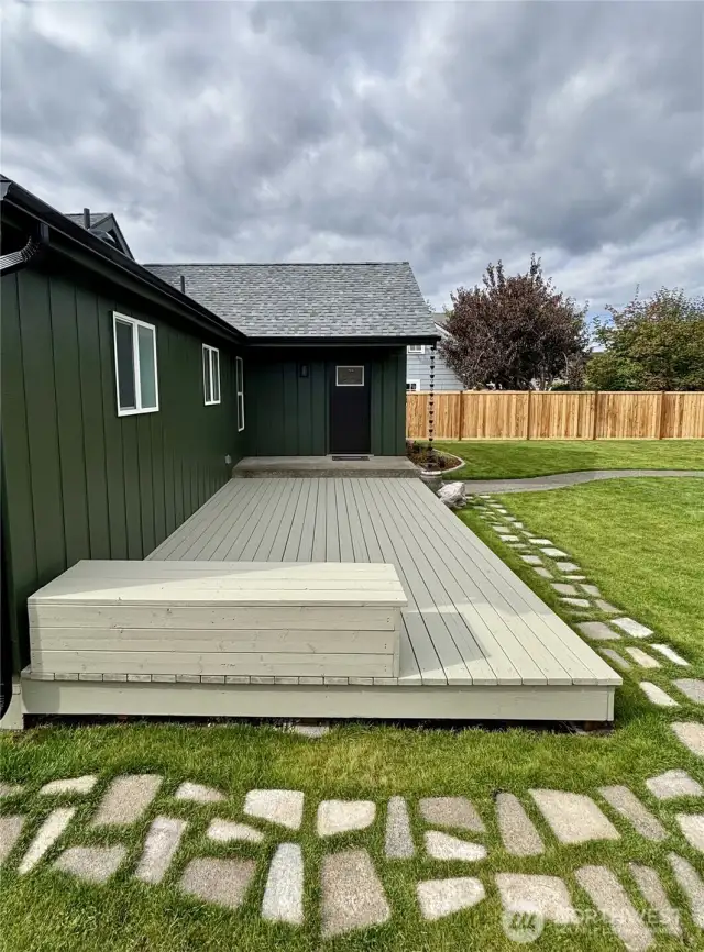 Stepping stone walkway around deck.
