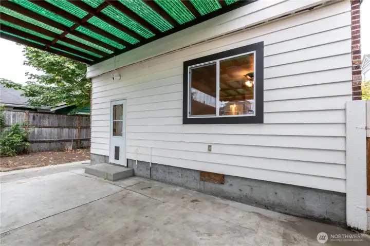 Covered patio off of rear of home is enjoyable all year round- shade in the summer and shelter in the rainy season.