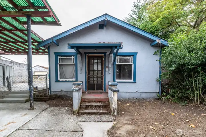 The "storage room" as it is now dubbed by the county.  Return it to its former sweetness and you have a small one bedroom unit- or tear it down and build a big garage with potential ADU above, as the pad(s) are already in place.  Options...