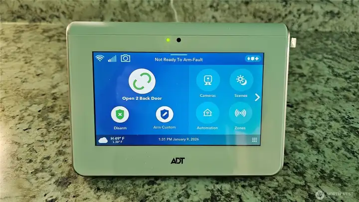 Security controller ADT on Kit Counter. be sure to re arm code in realtor info on listing