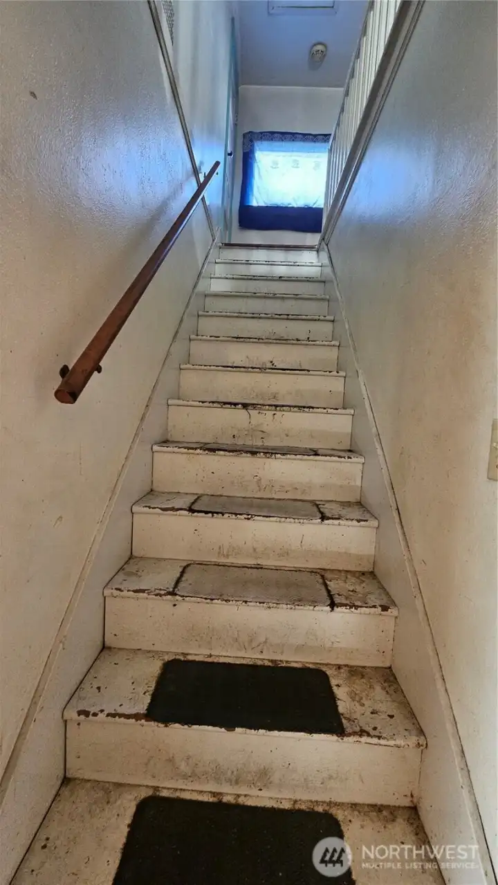 stairs to more Bedrooms under the eaves
