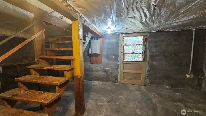 basement stairs from kitchen and direct access outside door