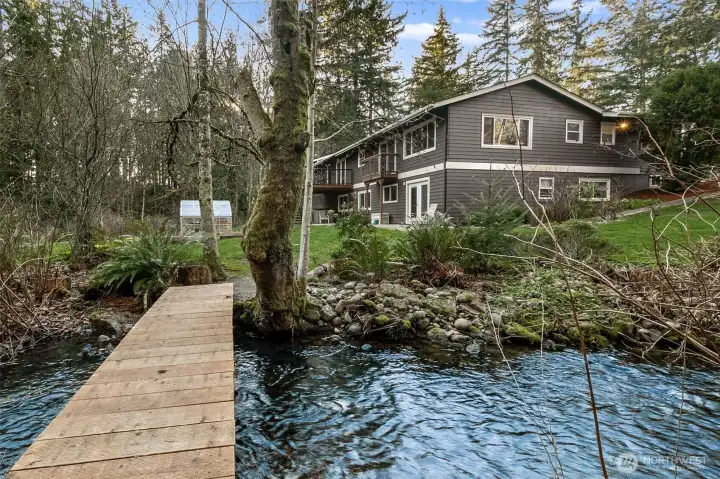 Your at-home retreat! Surrounded by Little Soos Creek which provides a pathway for nature: deer, otters, ducks, herons and even salmon in a good year!