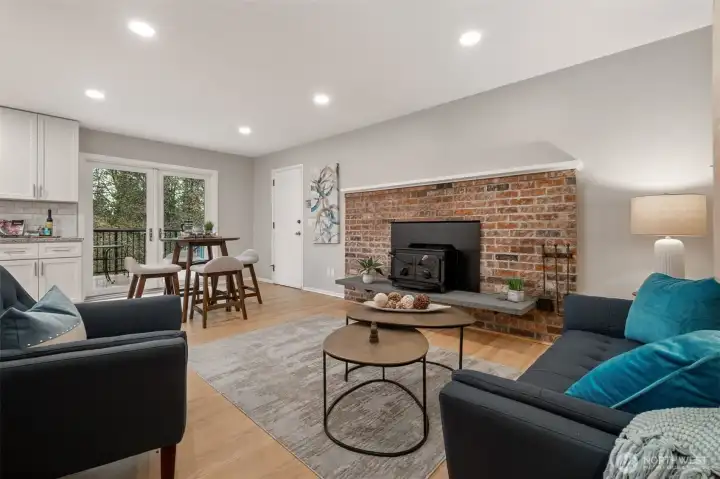 The family room, off the entry, the kitchen and French doors out to the deck.