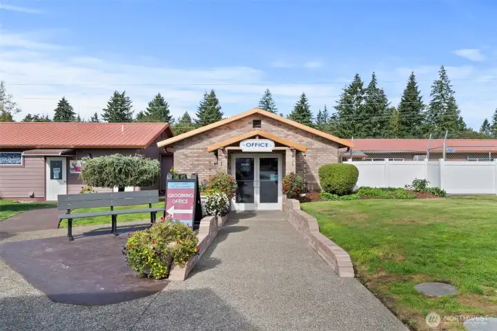 Inviting front entrance of the boarding and kennel office, designed to create a warm and professional first impression. This welcoming space is beautifully landscaped, with easy access and clear signage, ensuring visitors feel at ease from the moment they arrive.