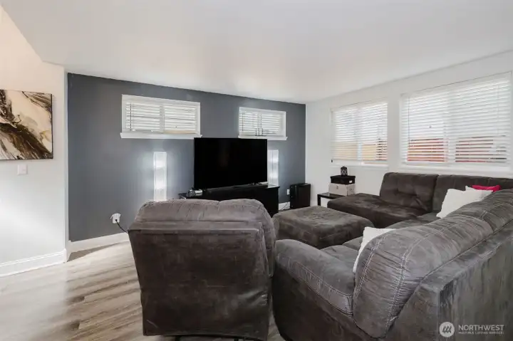 Living room with abundant windows and tons of natural light.