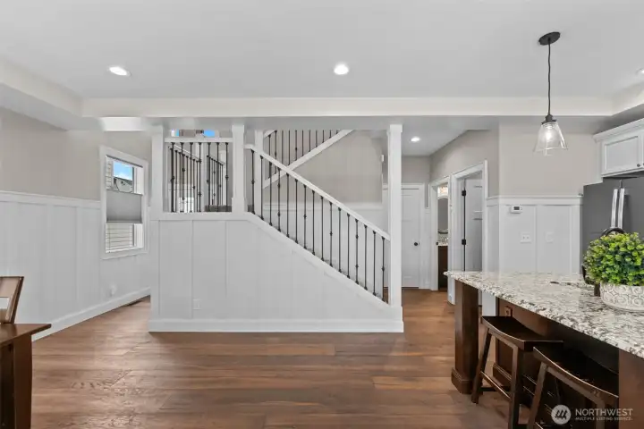 Kitchen/dining area looking towards the stairs.