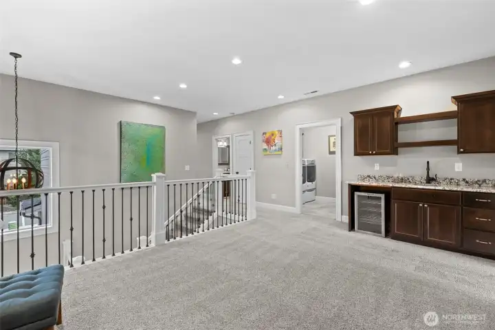 Upstairs bonus area with wet bar and wine refrigerator.