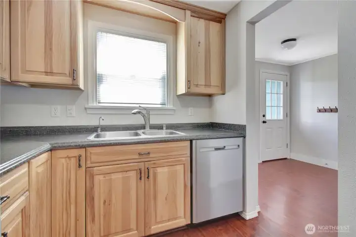 Kitchen boasts hickory cabinetry and SS appliances