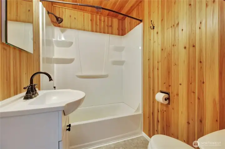 Full bath boasts cedar lined tongue and groove
