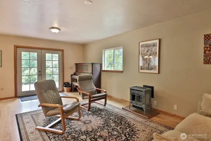 Comfortable gathering spaces perfect for everyday living. French doors lead to the expansive deck. Comfortable gathering spaces perfect for everyday living. French doors lead to the expansive deck.