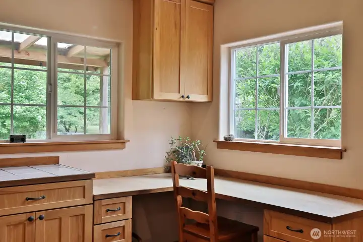 A convenient planning desk off the kitchen. A convenient planning desk off the kitchen.
