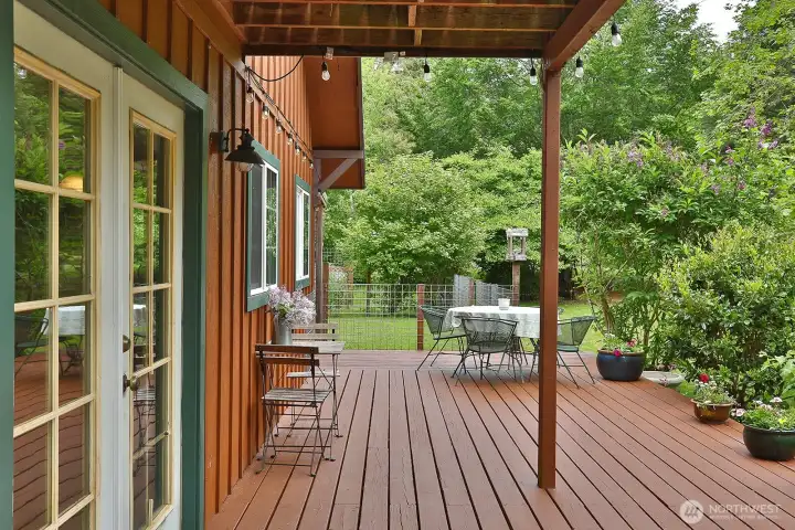 The lower level wraparound deck is perfect for relaxing or entertaining guests. The lower level wraparound deck is perfect for relaxing or entertaining guests.