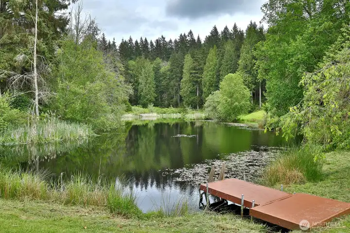 Stunning spring-fed lake shared with only one neighboring property. Stunning spring-fed lake shared with only one neighboring property.