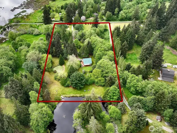 Aerial with an outline of the property. Aerial with an outline of the property.