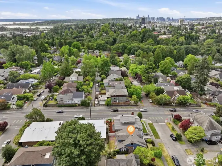 Aerial photo looking south. You can see Lake Washington, Lake Union and the city skyscrapers. Remarkable 95 walk score! Walk to light rail, Whole Foods, cafes & more! You are also only minutes to downtown, Amazon, & 502 making life exceptionally convenient. To top it off, the home is located in #1 sought after school cluster! Aerial photo looking south. You can see Lake Washington, Lake Union and the city skyscrapers. Remarkable 95 walk score! Walk to light rail, Whole Foods, cafes & more! You are also only minutes to downtown, Amazon, & 502 making life exceptionally convenient. To top it off, the home is located in #1 sought after school cluster!