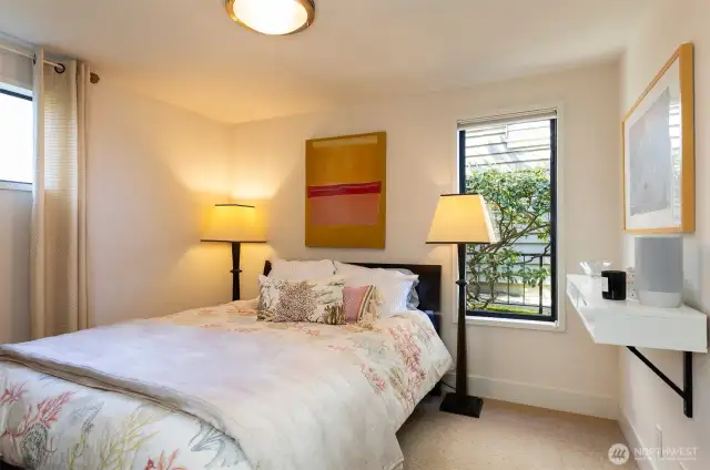 Third lower level bedroom is a calm space too.