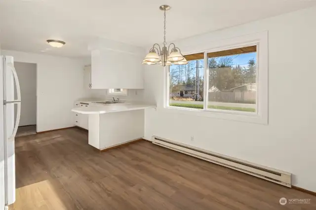 new flooring in kitchen and dining