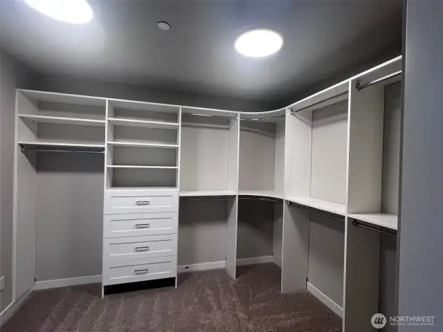 Actual Primary Closet shown.  Photos are for representational purposes only.  Colors and options may vary.