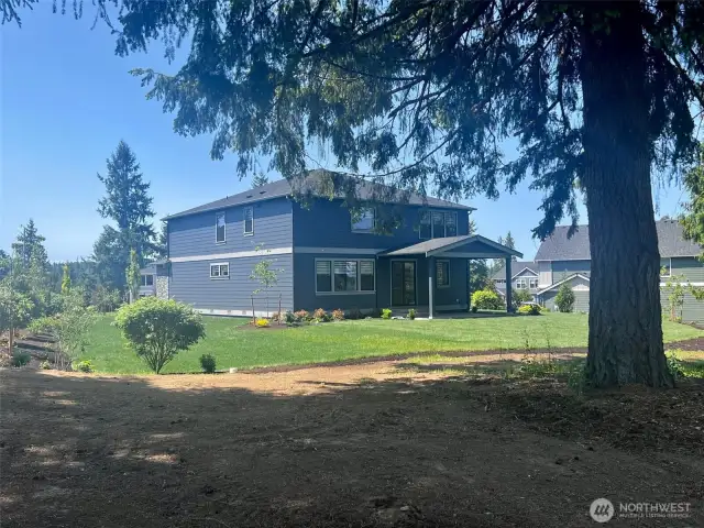 Another picture looking at back of home towards the covered patio. Photos are for representational purposes only.  Colors and options may vary.