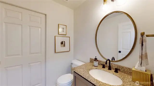 Half bath on the main floor.  Pocket door to laundry room.