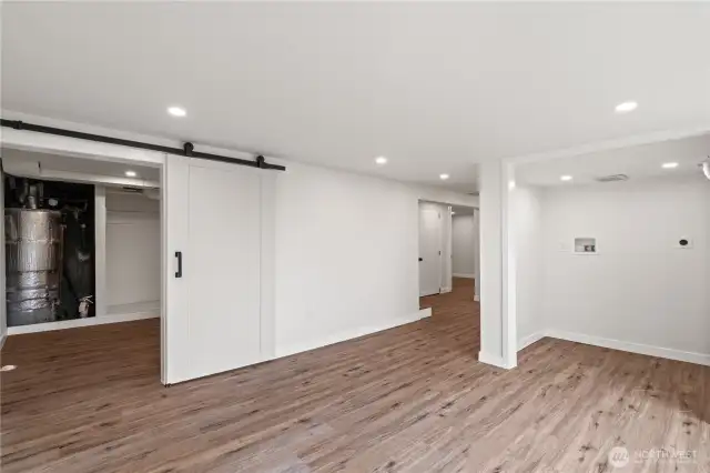 lower level extra living space with laundry and utility room