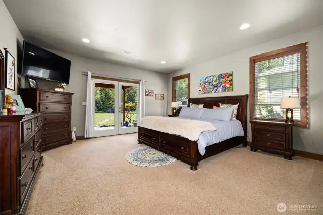 Primary Bedroom w/ french doors to patio