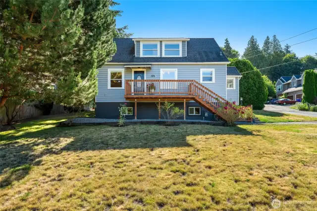 Front entrance and yard with composite deck.