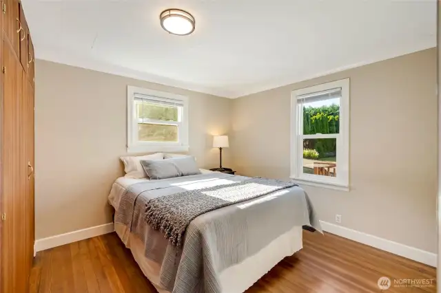 First bedroom on the main floor has plenty of room with a sizable closet. Views to the bayard.
