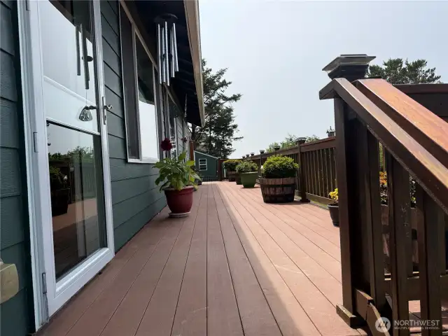 This composite wrap-around deck is low maintenance and great entertainment.        The \\